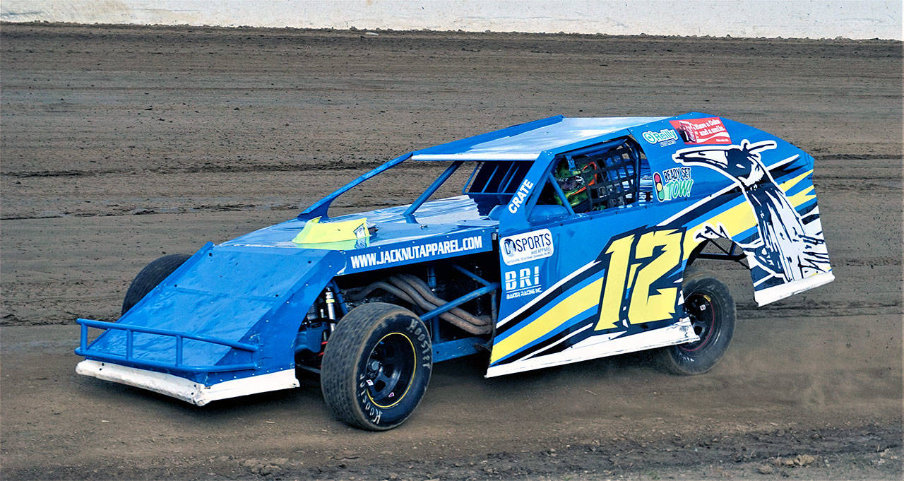 Zach Simpson races his modified car to victory in the feature race of the Shipwreck Beads Modified class on Saturday at Grays Harbor Raceway in Elma. (Photo by AR Racing Videos)