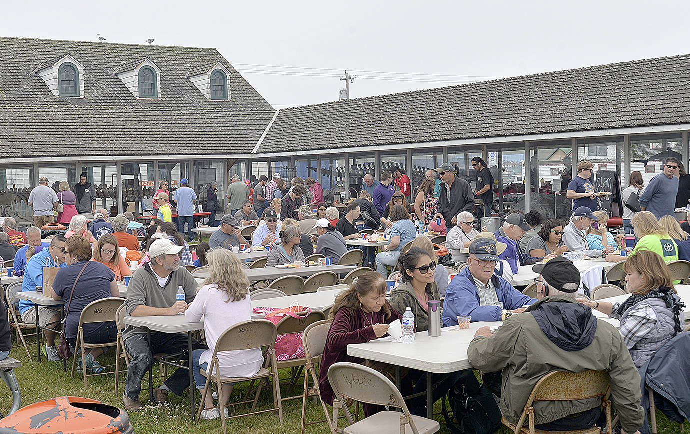 DAN HAMMOCK | GRAYS HARBOR NEWS GROUP                                Tables outside the Westport Maritime Museum were filling up shortly after the annual Westport Seafood Festival started serving at noon Saturday.