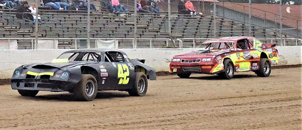 Scott Fritts (42) leads Zack Simpson during a street stocks race on Saturday at Grays Harbor Raceway in Elma. (Photo by AR Racing Videos)