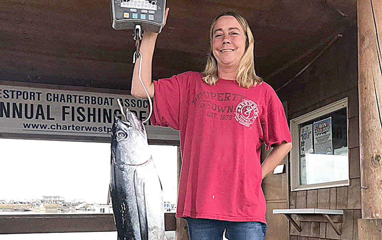 COURTESY WESTPORT WEIGHMASTER                                Bonnie Stinson of Kuna, Idaho, won the weekly Westport Charterboat Association tuna derby with a 25.05-pound albacore caught Sept. 11.