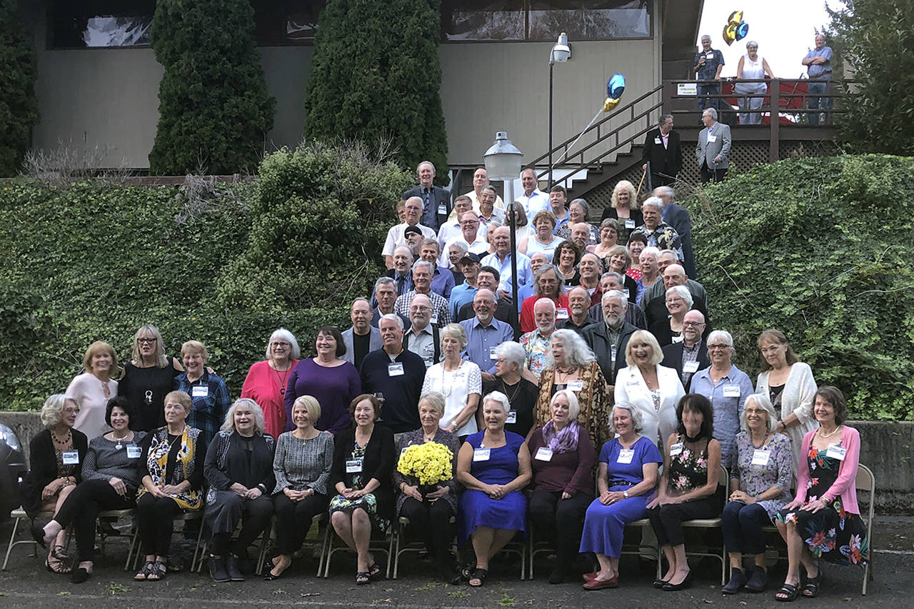 Photos courtesy Janet Bacon                                Aberdeen High School’s Class of 1969 raised $2,320 for the AHS band during its 50-year reunion this month. At left is the full contingent of attendees; at right are their St. Mary School alumni.