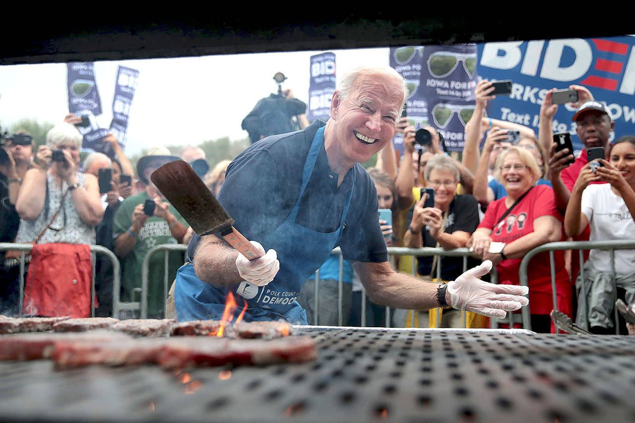 Democratic presidential candidate and former Vice President Joe Biden works the grill at the Polk County Democrats’ Steak Fry on Sept. 21 in Des Moines, Iowa. (Scott Olson/Getty Images)