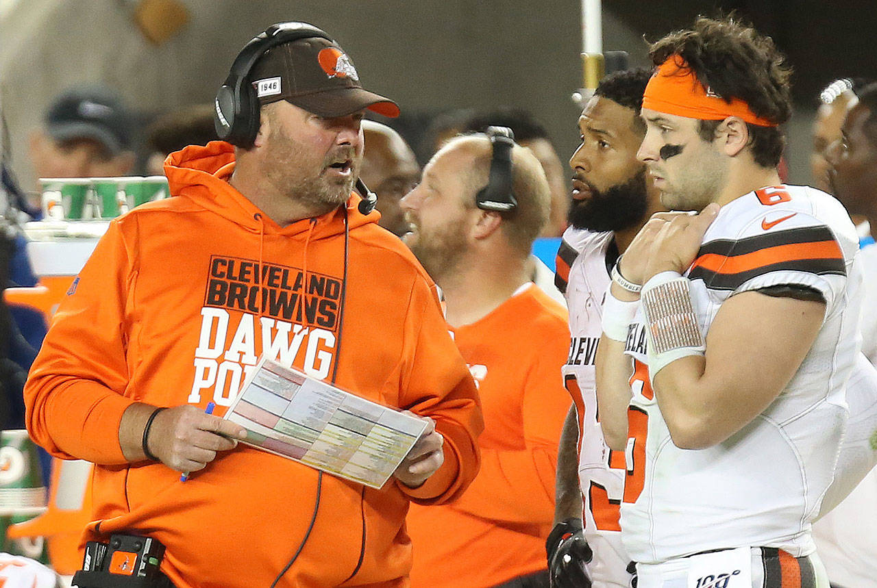 Cleveland Browns head coach Freddie Kitchens talks with quarterback Baker Mayfield and receiver Odell Beckham Jr. on the bench in the second half, October 7, 2019, at Levi’s Stadium in Santa Clara. (Tribune News Service)
