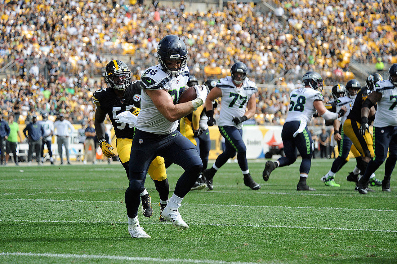 Will Dissly (88) of the Seattle Seahawks turns upfield against the Pittsburgh Steelers on Sunday, Sept. 15, 2019. Dissly is likely out for the season after suffering an Achilles injury in Sunday’s win over the Cleveland Browns. (Jason Pohuski/CSM/Zuma Press/TNS)