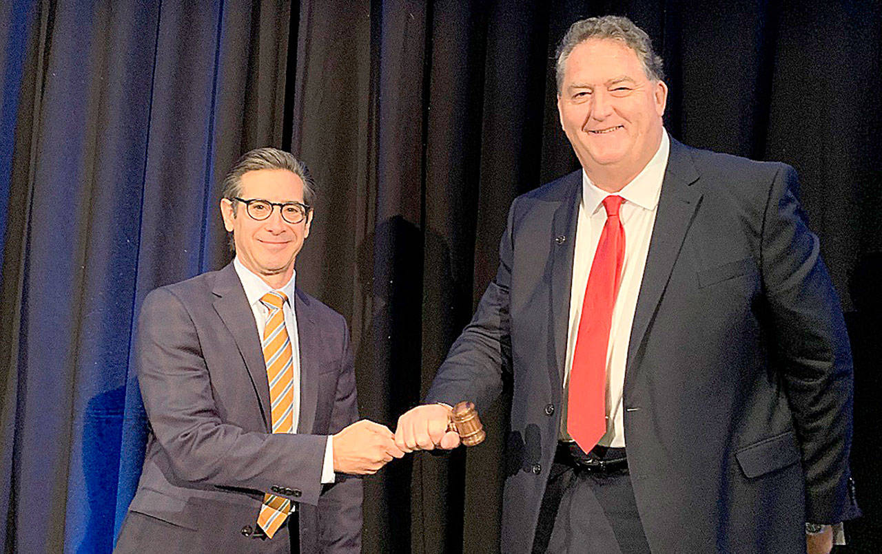 COURTESY PHOTO                                Outgoing American Association of Port Authorities Chairman Will Friedman passes the gavel to Port of Grays Harbor Executive Director Gary Nelson to begin his 1-year term as Chairman of the Board.