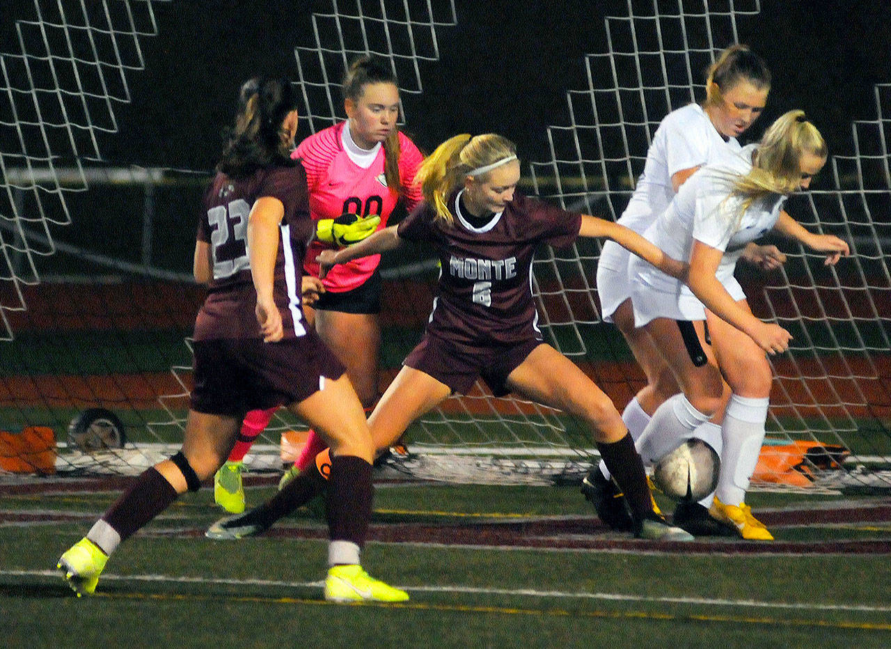 Montesano’s Anna Ayres (6) battles for a loose ball in the second half of a game against King’s Way Christian on Tuesday in Montesano. Ayres scored two goals in the Bulldogs’ 4-1 win over the Knights. (Hasani Grayson | Grays Harbor News Group)
