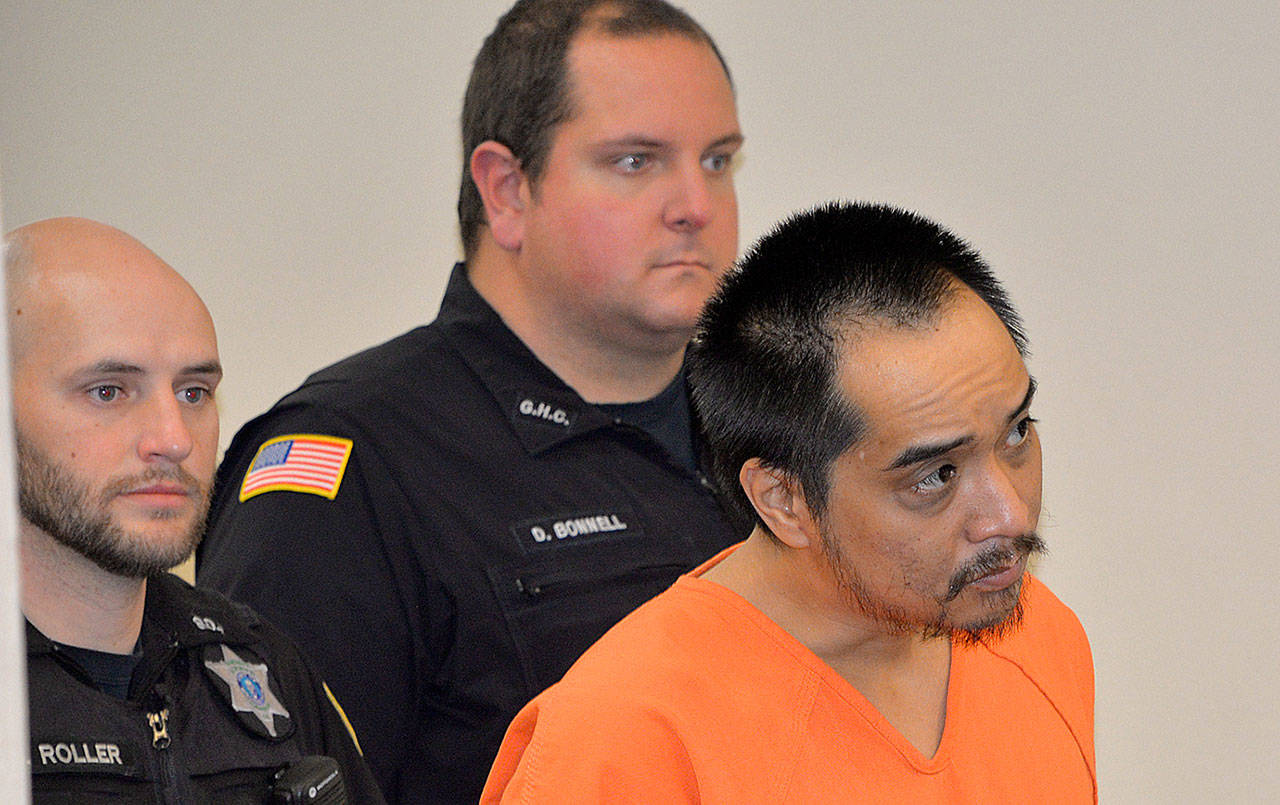 FILE PHOTO                                Edgar Concepcion Lugo makes his first court appearance Nov. 20, 2018, the day after he was arrested for stabbing his mother to death in a South Aberdeen home the previous day. Lugo recently filed a motion to withdraw a plea deal he signed in late September.