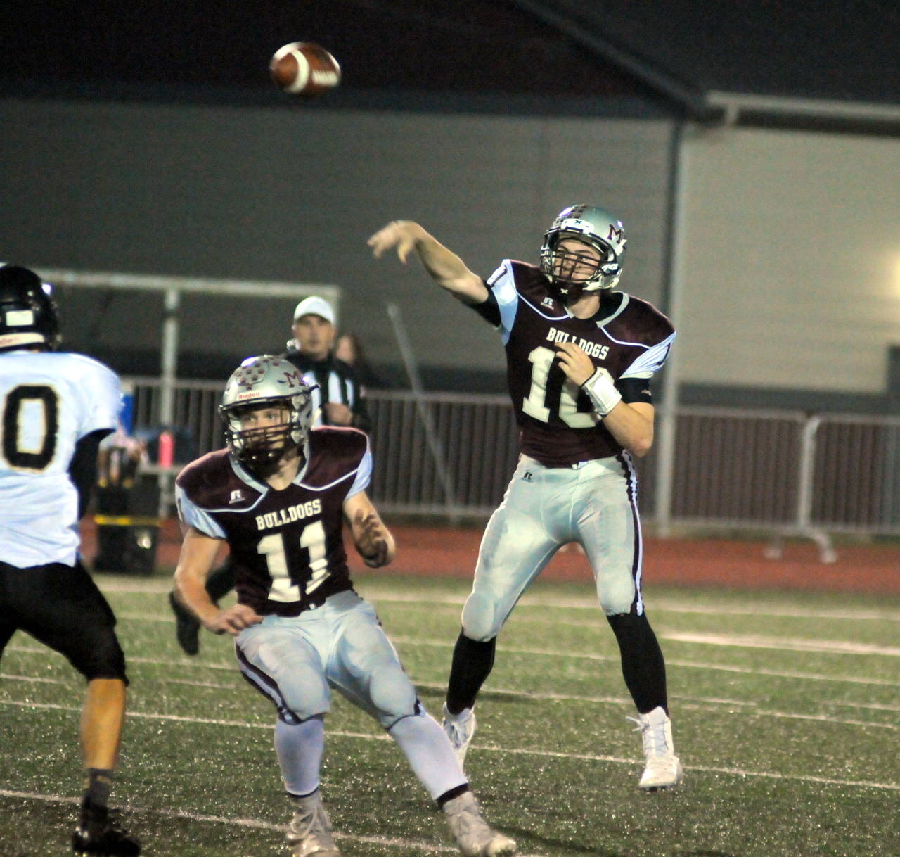 Montesano quarterback Trace Ridgway throws a pass during the Bulldogs’ 58-14 win over Meridian in the first round of the 1A State Football Tournament on Friday in Montesano. Ridgway threw for 186 yards and four touchdowns in the victory. (Ryan Sparks | Grays Harbor News Group)