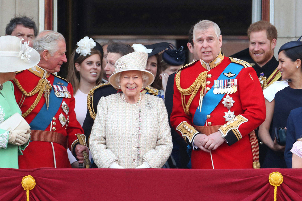 Queen Elizabeth II, center, and Prince Andrew, Duke of York, right, during Trooping The Colour, the Queen’s annual birthday parade on June 8 in London. (Chris Jackson/Getty Images)
