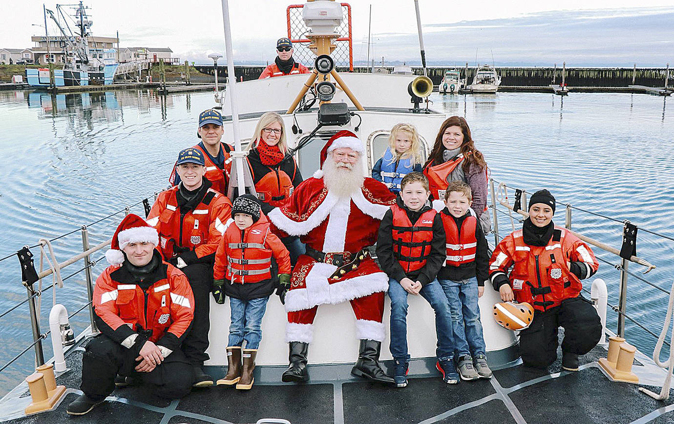 COURTESY PHOTO                                Santa will arrive at Westport’s Santa by the Sea celebration Saturday via Coast Guard vessel at Float 6 in the Westport Marina before making his way to the museums lens hall to meet with the kids.