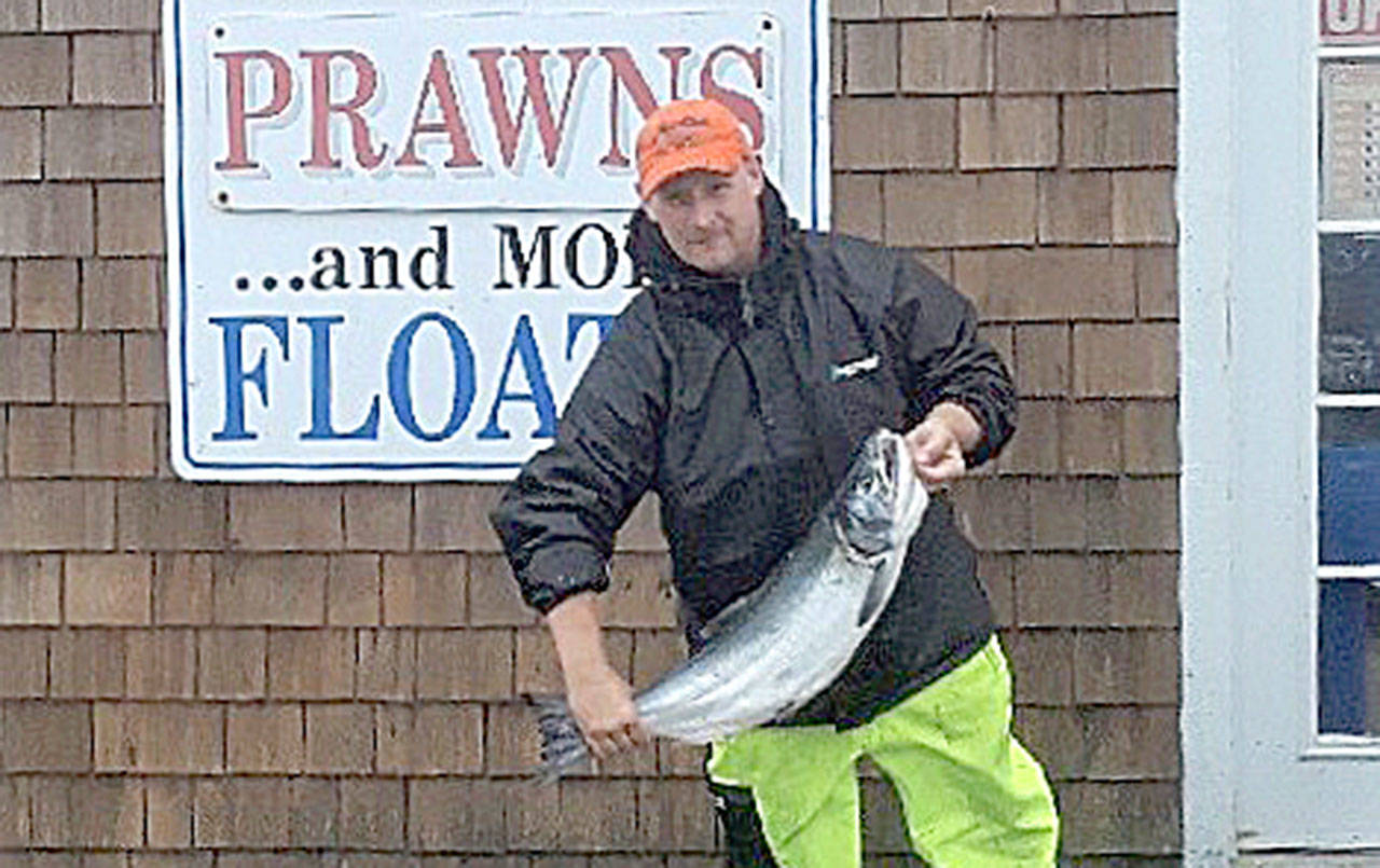 COURTESY PHOTO                                Spencer Hornick of Spanaway won the annual Vern Coverdale Memorial Boat Basin Salmon Derby with an 11-pound, 7-ounce coho caught in late September.