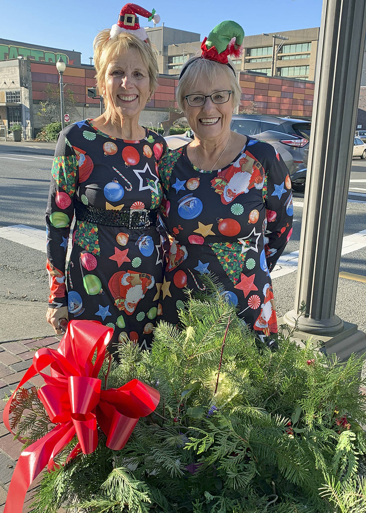 Kat Bryant | Grays Harbor News Group                                Bette Worth, left, and Bobbi McCracken are dressing up downtown Aberdeen for Winterfest.