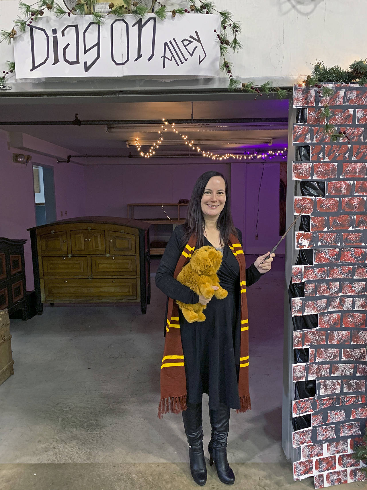 Kat Bryant | Grays Harbor News Group                                Brandi Bednarik, executive director of the Grays Harbor Historical Seaport, is going full Harry Potter for Winterfest at the Seaport.