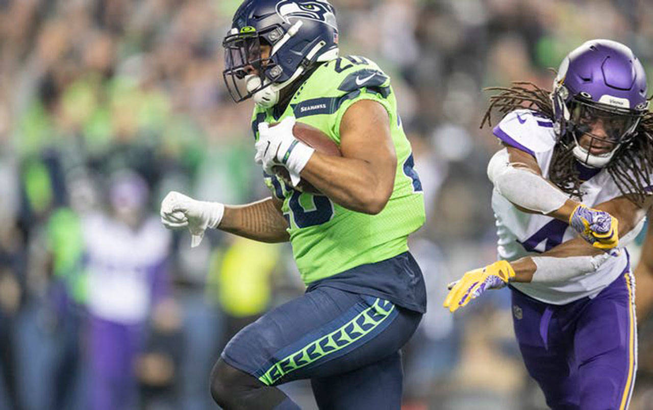 Seahawks running back Rashaad Penny, seen here against the Minnesota Vikings earlier this season, suffered a season-ending knee injury in Sunday’s loss to the Los Angeles Rams. (Tribune News Service)