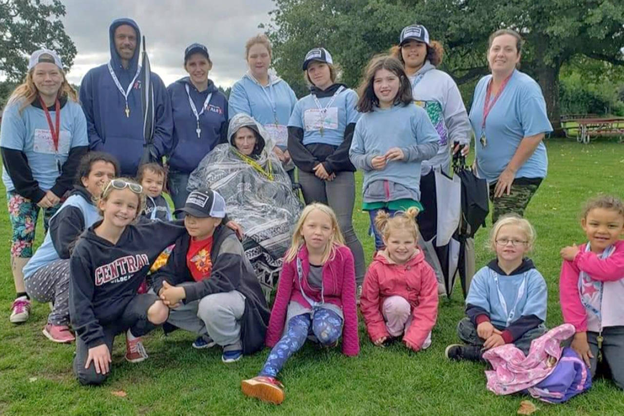 Courtesy photos                                This contingent of Grays Harbor Differently Abled Families participated in the 2019 ALS Walk in Seattle. Standing at far left is the group’s founder, Sarah Worthington. At the center, wrapped in a blanket and rain poncho, is Edna Langton, whose battle with ALS (commonly known as Lou Gehrig’s Disease) ended Dec. 1 at age 60.