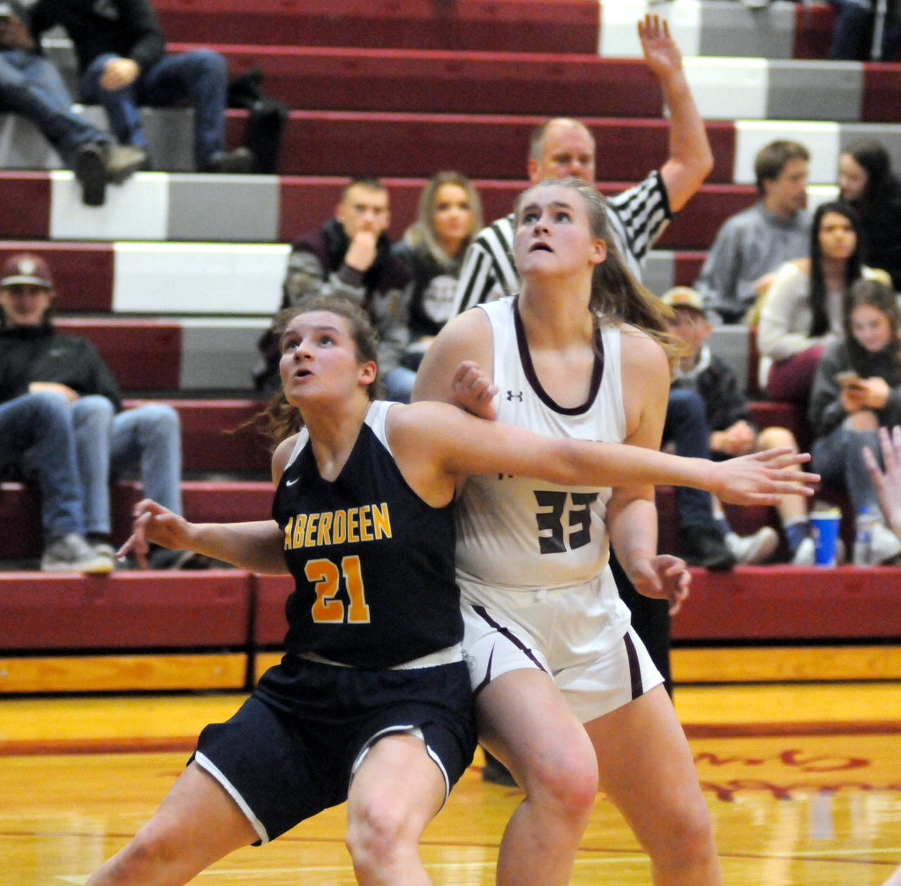 Aberdeen’s Aliyah Tageant (21) and Montesano’s Zoe Hutchings compete for a rebound during Tuesday’s game in Monte. Tageant led Aberdeen with 18 points while Hutchings led Montesano with 19 points. (Ryan Sparks | Grays Harbor News Group)