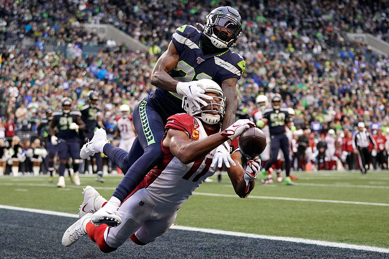 The Seahawks are hobbled and throttled by the Cardinals, and a bigger game looms
