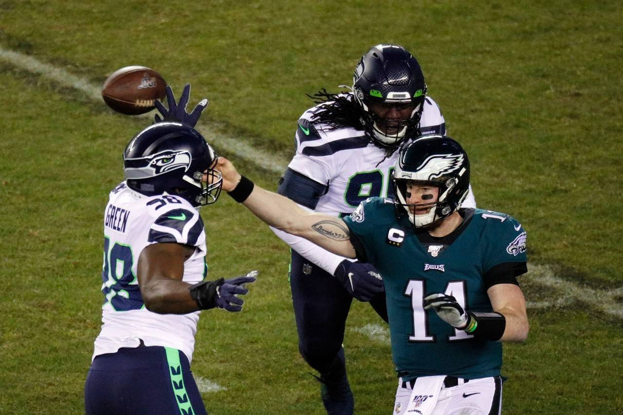It took four seasons for quarterback Carson Wentz to finally get a postseason start for the Philadelphia Eagles, and only eight plays for that long-awaited opportunity to come to an end against the Seattle Seahawks on Sunday, Jan. 5, 2020. (Elizabeth Robertson/The Philadelphia Inquirer/TNS)