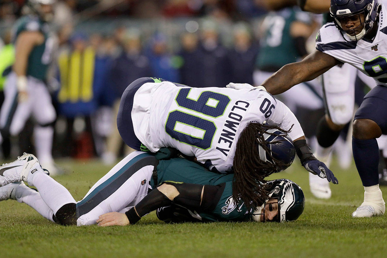 Seattle Seahawks defensive end Jadeveon Clowney lands on Philadelphia Eagles quarterback Carson Wentz during the first quarter on Sunday, Jan. 5, 2020 at Lincoln Financial Field in Philadelphia, Pa. (Yong Kim/The Philadelphia Inquirer/TNS)