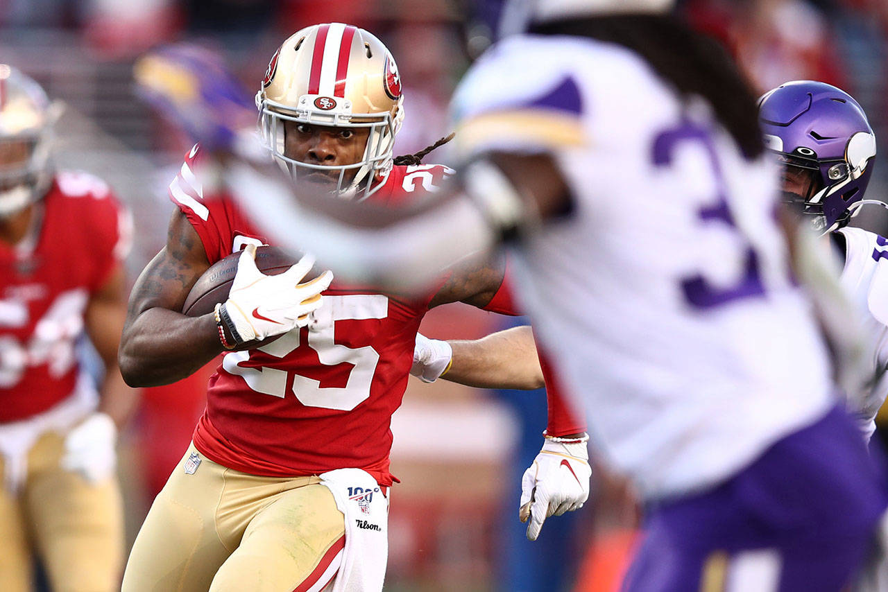 San Francisco 49ers defensive back Richard Sherman (25) runs after intercepting a pass against the Minnesota Vikings in the third quarter of the NFC Divisional Round Playoffs at Levi’s Stadium in Santa Clara, California, on Saturday, Jan. 11, 2020. (Ezra Shaw/Getty Images/TNS)