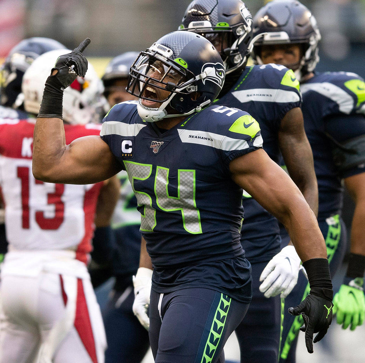 Seattle Seahawks middle linebacker Bobby Wagner (54) celebrates after tackling Arizona Cardinals wide receiver Pharoh Cooper (12) in the first half on Sunday, Dec. 22, 2019 at CenturyLink Field, in Seattle, Wash. (Amanda Snyder/Seattle Times/TNS)