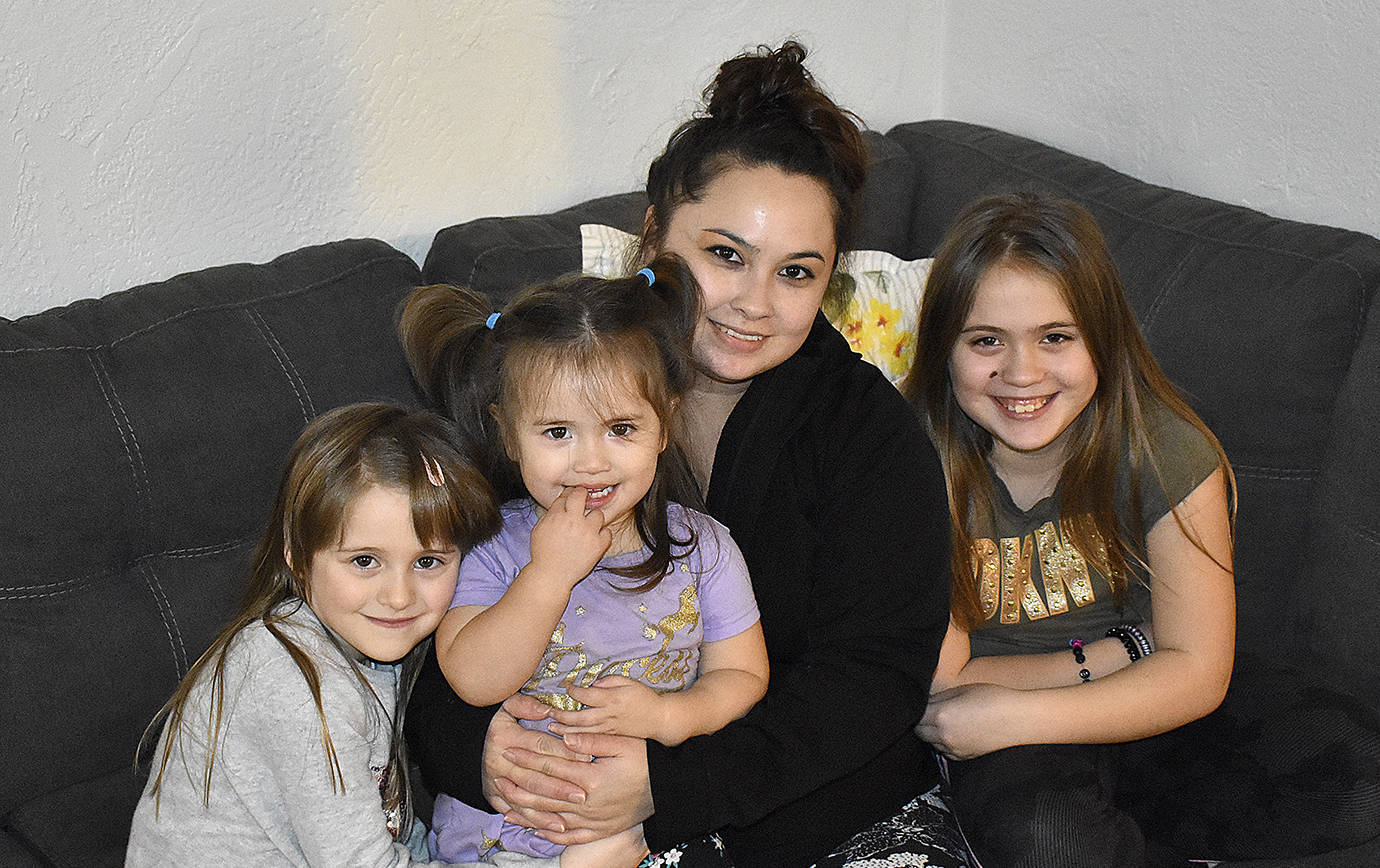 DAN HAMMOCK | GRAYS HARBOR NEWS GROUP                                 Abby Billie is a single mother of three from Aberdeen juggling shift work with child care. From left, Emmalin, 6, Isabella, 2, Abby, and Gabriella, 9.