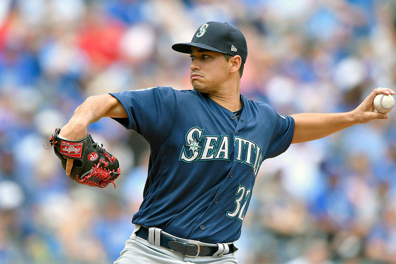Seattle Mariners starting pitcher Marco Gonzales throws in the first inning against the Kansas City Royals on Sunday, Aug. 6, 2017 at Kauffman Stadium in Kansas City, Mo. Gonzales signed a four-year contract extension estimated to be worth more than $30 million on Monday. (John Sleezer/Kansas City Star/TNS)