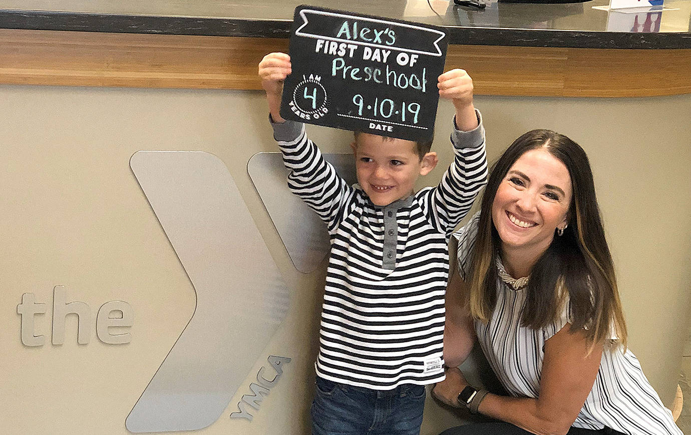 COURTESY YMCA OF GRAYS HARBOR                                 YMCA of Grays Harbor CEO/Executive Director Franzine Potts with Alex Steele on the first day of preschool classes this past September.