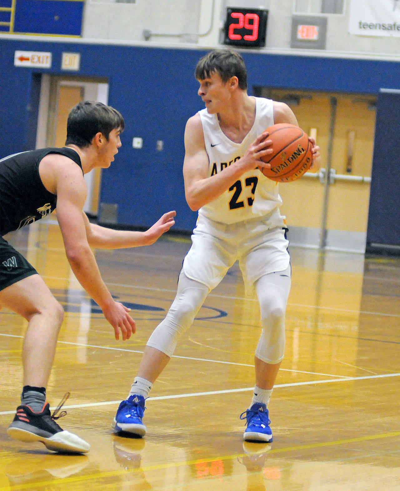Aberdeen’s Wyatt Johnson, seen here against Woodland on Thursday, was named to the 2A Evergreen All-League Second Team after leading the Bobcats in scoring with 11.5 points per game this season. (Ryan Sparks | Grays Harbor News Group)