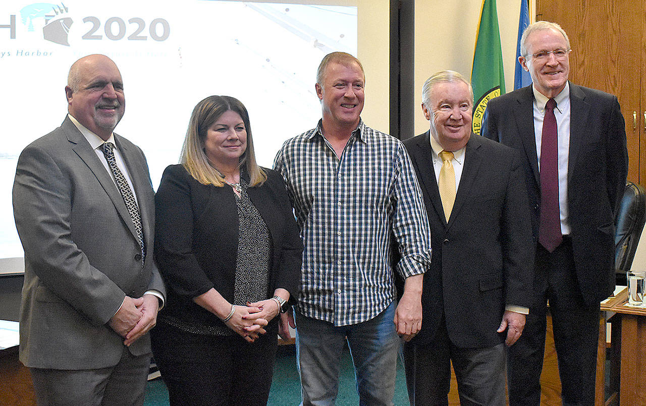 DAN HAMMOCK | GRAYS HARBOR NEWS GROUP                                 Port of Grays Harbor commissioners approved the lease assignments related to the sale of Masco Petroleum to PetroCard Inc. Feb. 18. From left, Port Commissioner Phil Papac, PetroCard President and CEO Laura Yellig, Masco owner and President Jim Mason, and Port Commissioners Stan Pinnick and Tom Quigg.