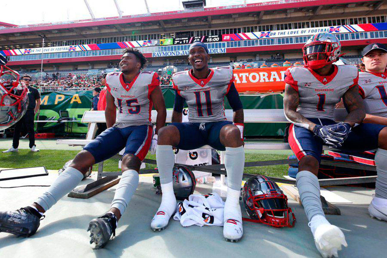 Houston quarterback PJ Walker, center, enjoys a win over Tampa Bay on Saturday, Feb. 22. Walker is being scouted as a potential backup for Seahawks quarterback Russell Wilson. (Tribune News Service)