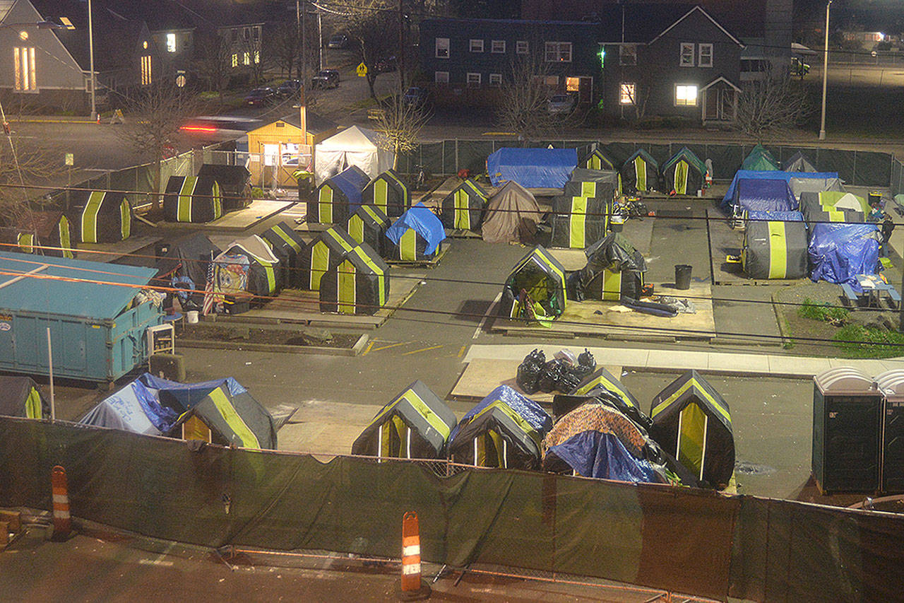 The temporary homeless camp located in the parking lot behind Aberdeen City Hall during a City Council meeting at which the future of the camp was debated Wednesday night. (Thorin Sprandel | Grays Harbor News Group)