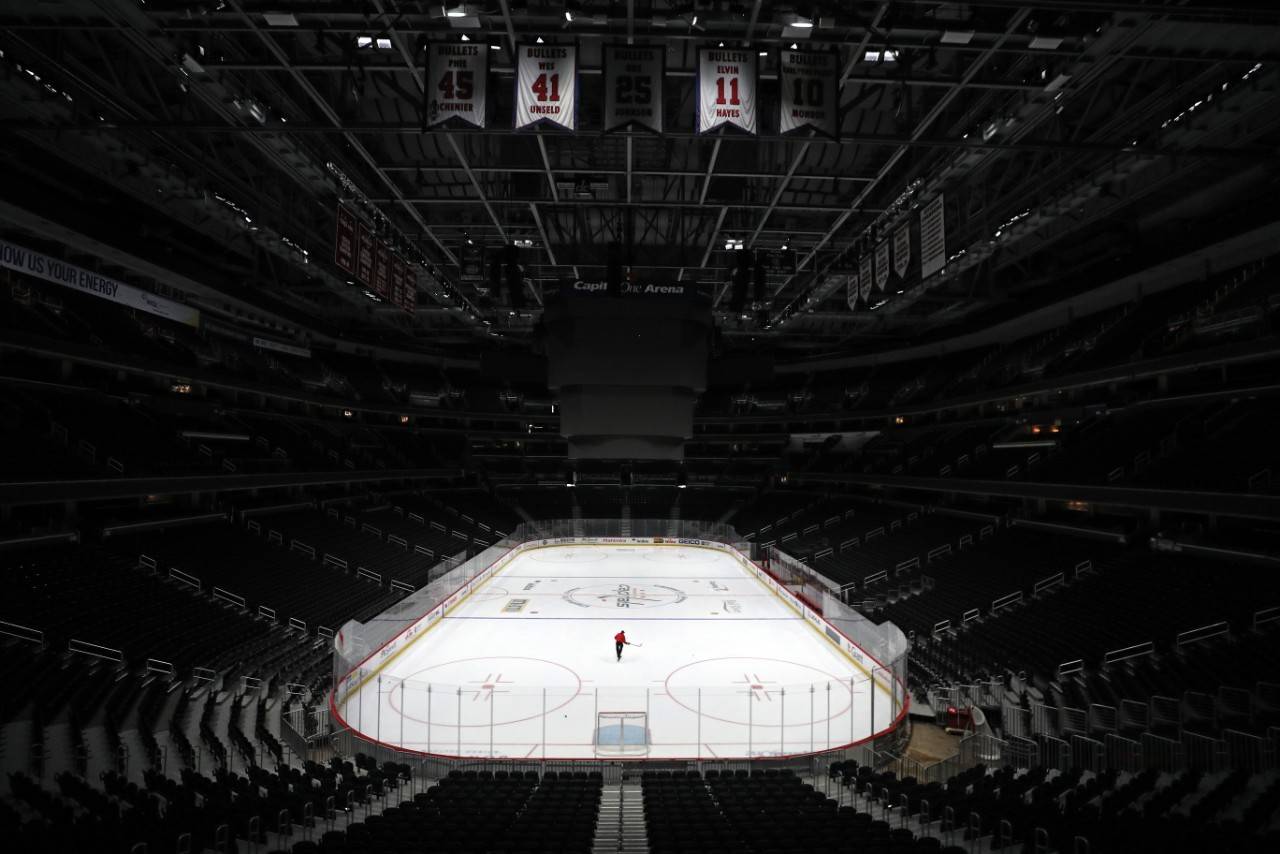 Sam Hess, Operations with Monumental Sports & Entertainment, skates alone prior Detroit Red Wings playing against the Washington Capitals at Capital One Arena on March 12, 2020 in Washington, D.C. Today the NHL announced is has suspended their season due to the uncertainty of the coronavirus (COVID-19) with hopes of returning. The NHL currently joins the NBA, MLS, as well as other sporting events and leagues around the world suspending play because of the coronavirus outbreak. (Patrick Smith | Getty Images/TNS)