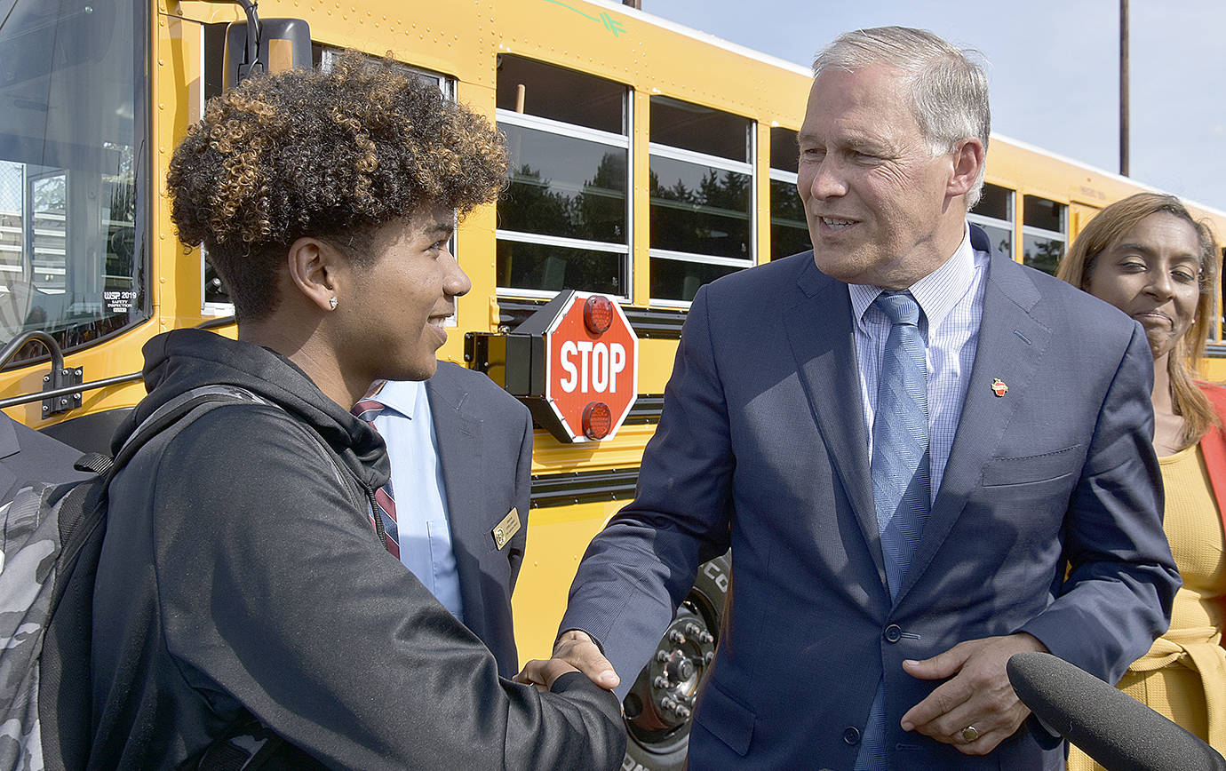 COURTESY OFFICE OF THE GOVERNOR                                 On June 17, 2019, Gov. Jay Inslee attended the ribbon-cutting ceremony for the first electric school bus in Washington at Franklin Pierce High School in Tacoma. The Elma and Lake Quinault school districts were recently awarded more than $600,000 in Ecology grant money to purchase two electric school buses.