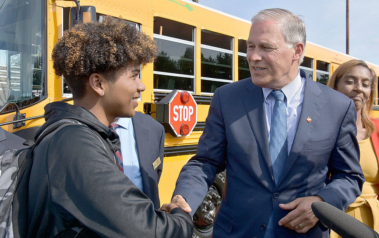 COURTESY OFFICE OF THE GOVERNOR                                 On June 17, 2019, Gov. Jay Inslee attended the ribbon-cutting ceremony for the first electric school bus in Washington at Franklin Pierce High School in Tacoma. The Elma and Lake Quinault school districts were recently awarded more than $600,000 in Ecology grant money to purchase two electric school buses.