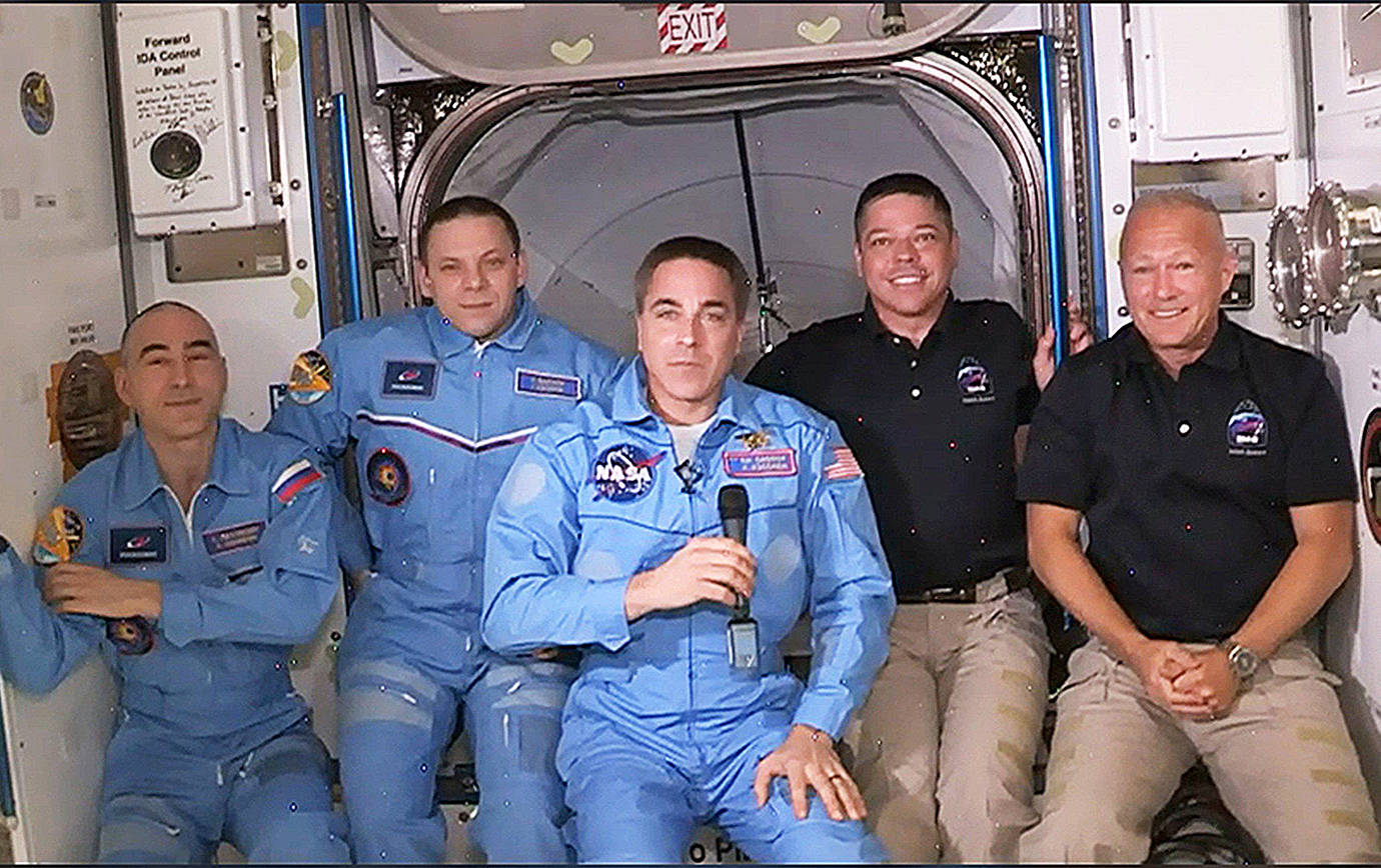 The International Space Station crew has expanded to five members with the arrival of the SpaceX Crew Dragon. From left, Anatoly Ivanishin, Ivan Vagner, Chris Cassidy, Bob Behnken and Doug Hurley.