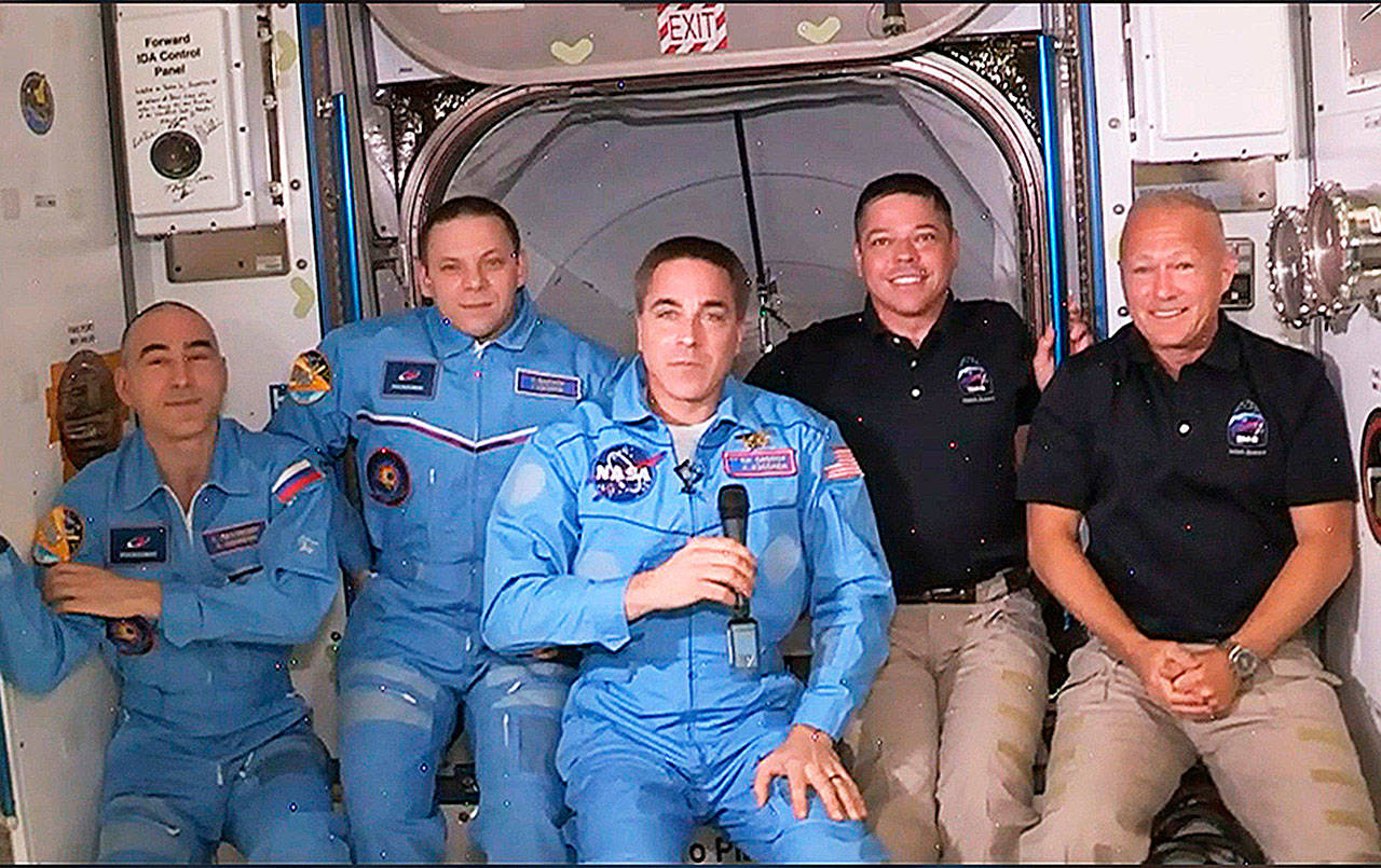 The International Space Station crew has expanded to five members with the arrival of the SpaceX Crew Dragon. From left, Anatoly Ivanishin, Ivan Vagner, Chris Cassidy, Bob Behnken and Doug Hurley.