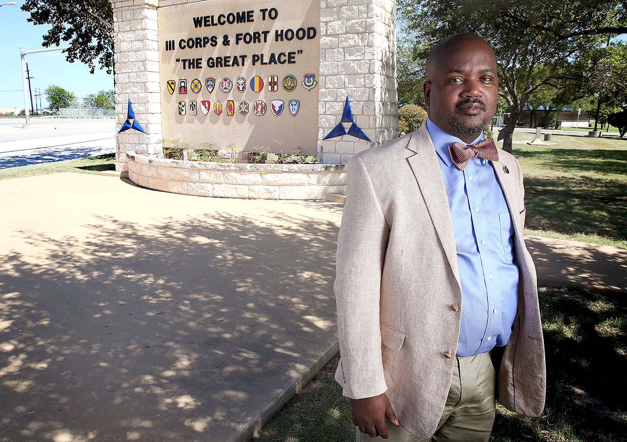 Riakos Adams, secretary of the Killeen chapter of the NAACP, poses outside Fort Hood. The post is named for Confederate Gen. John Bell Hood, and the NAACP and others want it renamed. (Rose Baca/Dallas Morning News)