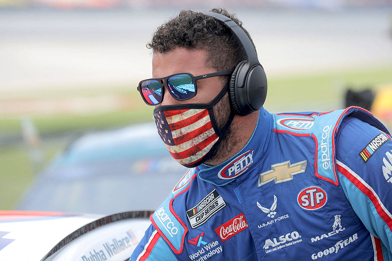 Bubba Wallace prepares for the NASCAR Cup Series GEICO 500 at Talladega Superspeedway on Monday in Talladega, Alabama. A noose was found in the garage stall of NASCAR driver Bubba Wallace at Talladega Superspeedway a week after the organization banned the Confederate flag at its facilities. (Chris Graythen/Getty Images)