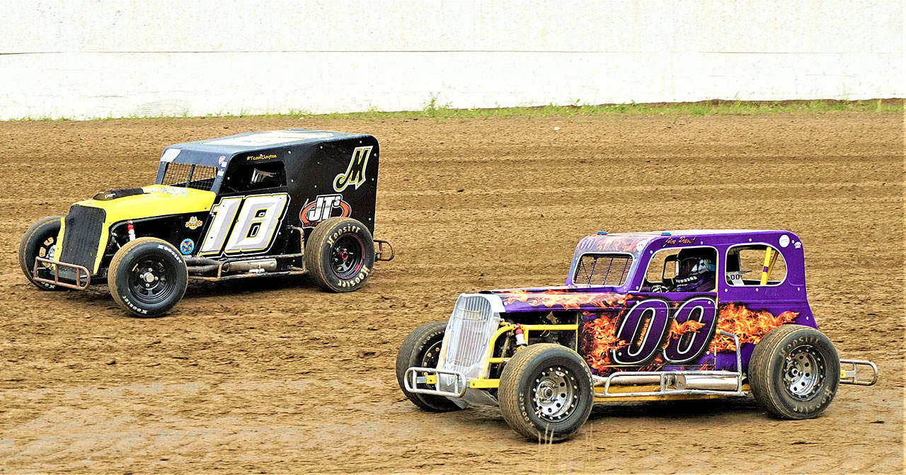 Shane Youngren, left, and Jim Pavel race during the Dwarf Cars events at Grays Harbor Raceway on Saturday night (Photo by AR Racing Videos)