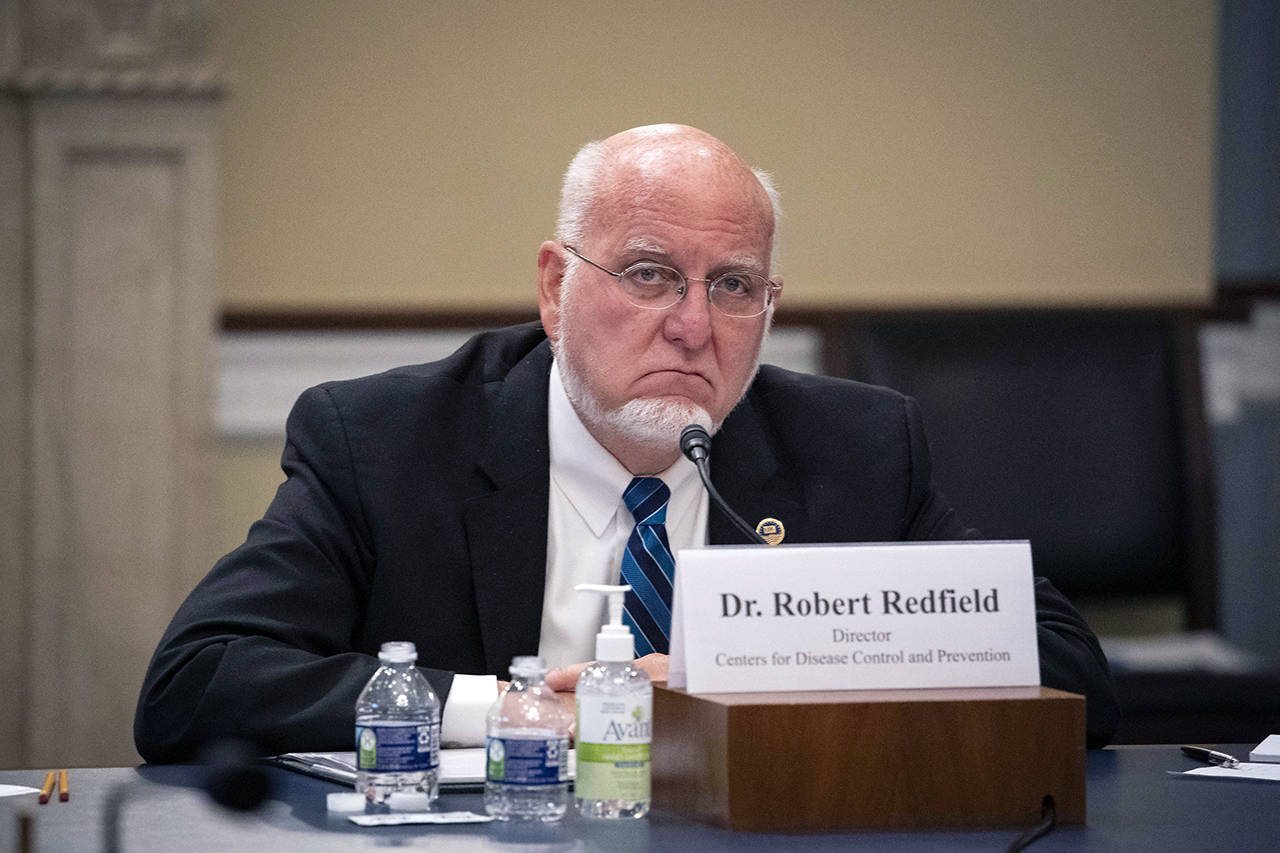 Robert Redfield, director of the Centers for Disease Control and Prevention, listens during a House Appropriations Subcommittee hearing June 4 on Capitol Hill. (Al Drago | Abaca Press)