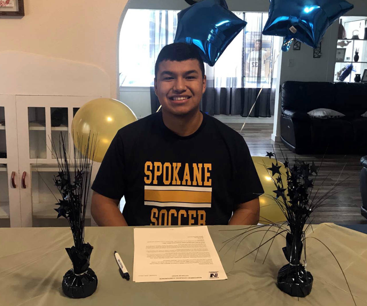 Aberdeen’s Romeo Sanchez poses for a photo after signing a National Letter of Intent to play soccer for Spokane Community College on June 9. (Photo courtesy of Aberdeen High School)
