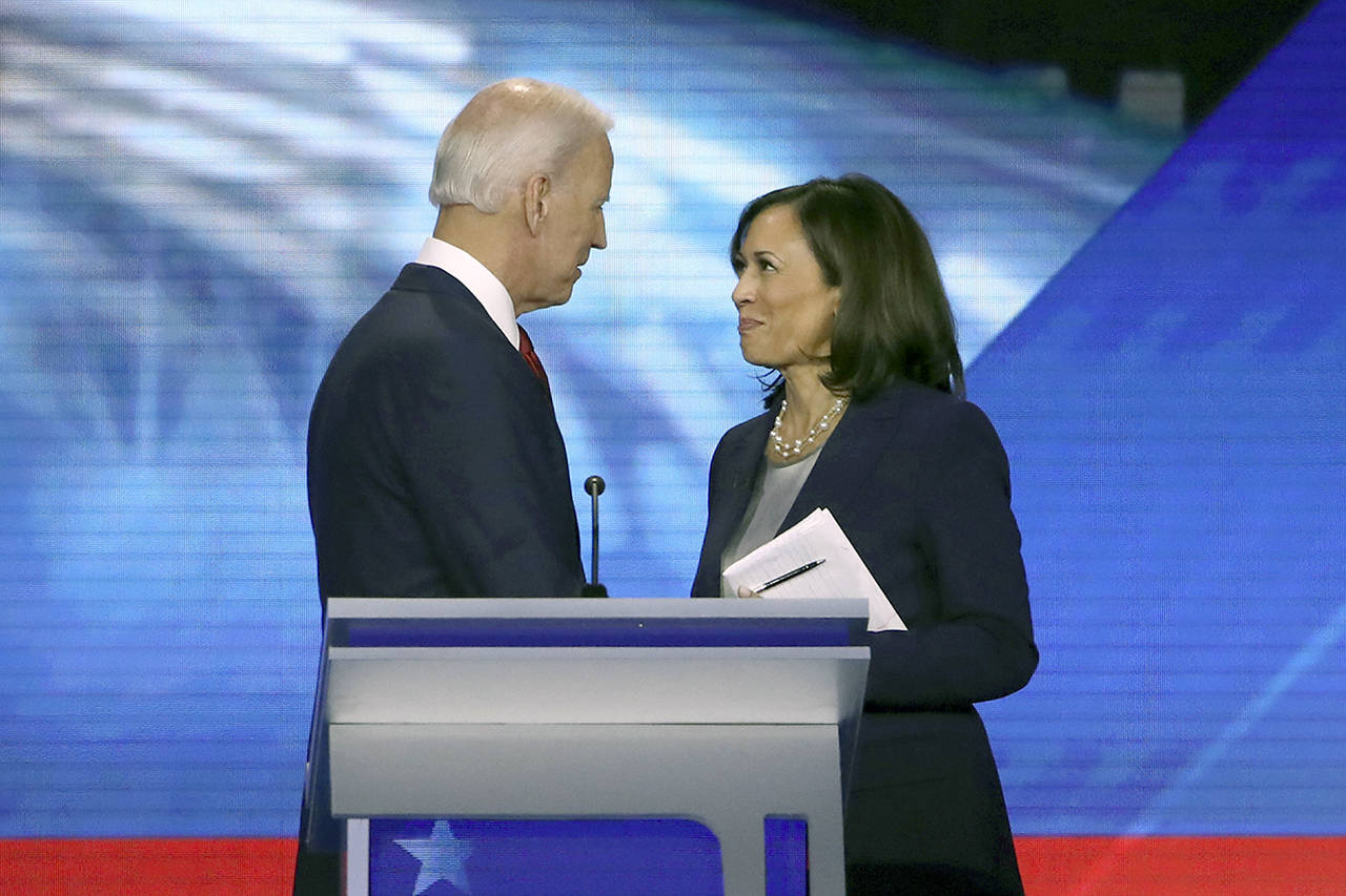 Win McNamee | Getty Images                                Joe Biden and Sen. Kamala Harris (D-Calif.) speak after the Democratic presidential debate Sept. 12 in Houston.