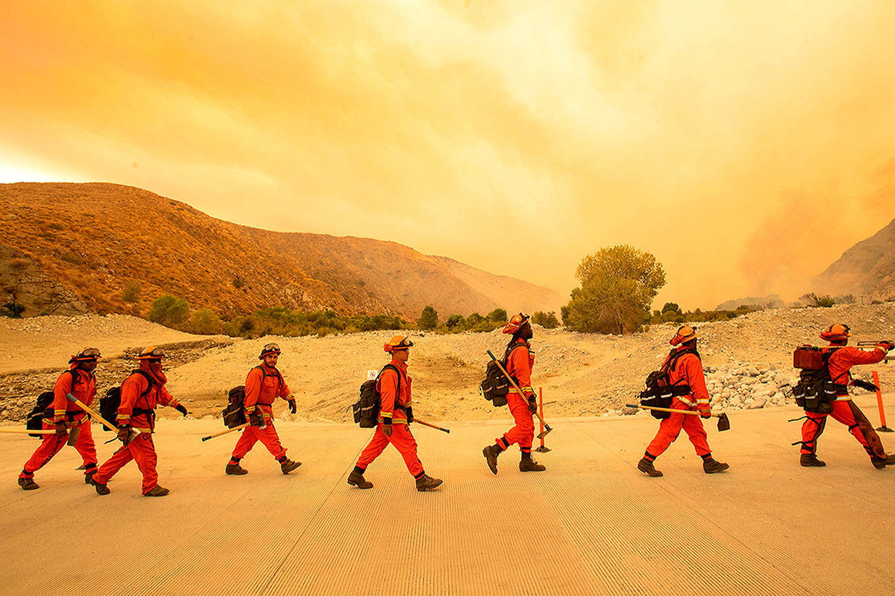 California prison camp inmates battle wildfires