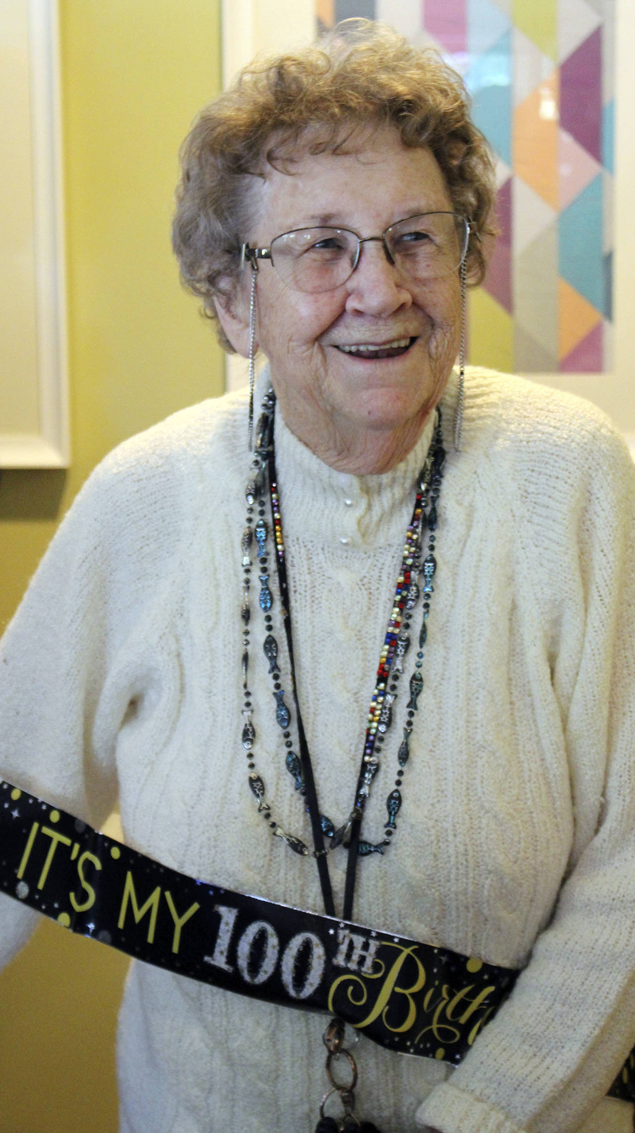 Photo by Dee Anne Shaw                                Ruth McCausland proudly sported a sash reading “It’s my 100th birthday!” during a celebration held in July 2019.