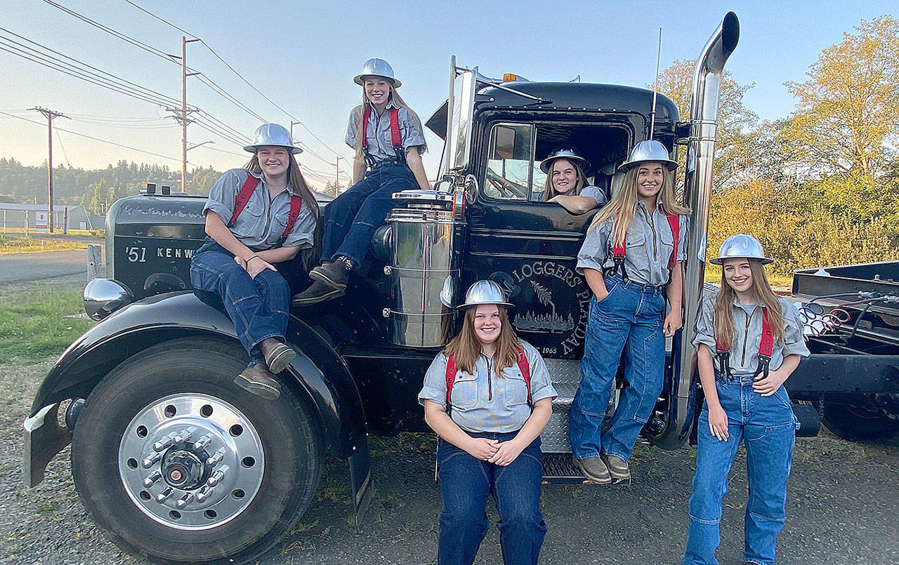 Courtesy photo                                The 2020 Loggers Playday court poses with the Playday truck. From left are Katie Burnett, Elizabeth Folkers, Ainsley Estes (seated), Amelia Moir (in window), Emiley Elders and Emily Daniels.