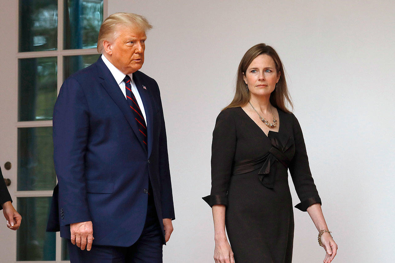 President Donald Trump arrives with Judge Amy Coney Barrett to introduce her as his Supreme Court Associate Justice nominee in the Rose Garden of the White House in Washington, D.C., on Saturday. (Yuri Gripas/Abaca Press)