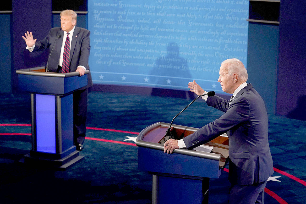 President Donald Trump and former Vice President and Democratic presidential nominee Joe Biden speak during the first presidential debate Tuesday night in Cleveland, Ohio. (Pool Photo)