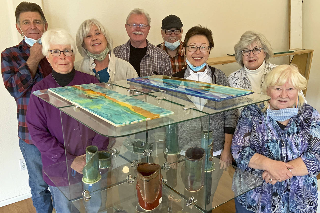 Ten local artisans have established the Grays Harbor Potters Guild at 2244 Simpson Ave. in Hoquiam. They plan to open their space next weekend for demonstrations and retail sales. Initial hours will be 10 a.m. to 3 p.m. every Friday through Sunday. Pictured, from left, are Gary Ganz, Lyn Nelson, Cindy Dana, Ken Slaughter, Richard Young, Evie Cheung, Melanie Knight and Pam Otteson. The two members not pictured are Sandy Early and Nancy Williams. Watch The Daily World next week for the full story. (Kat Bryant | The Daily World)