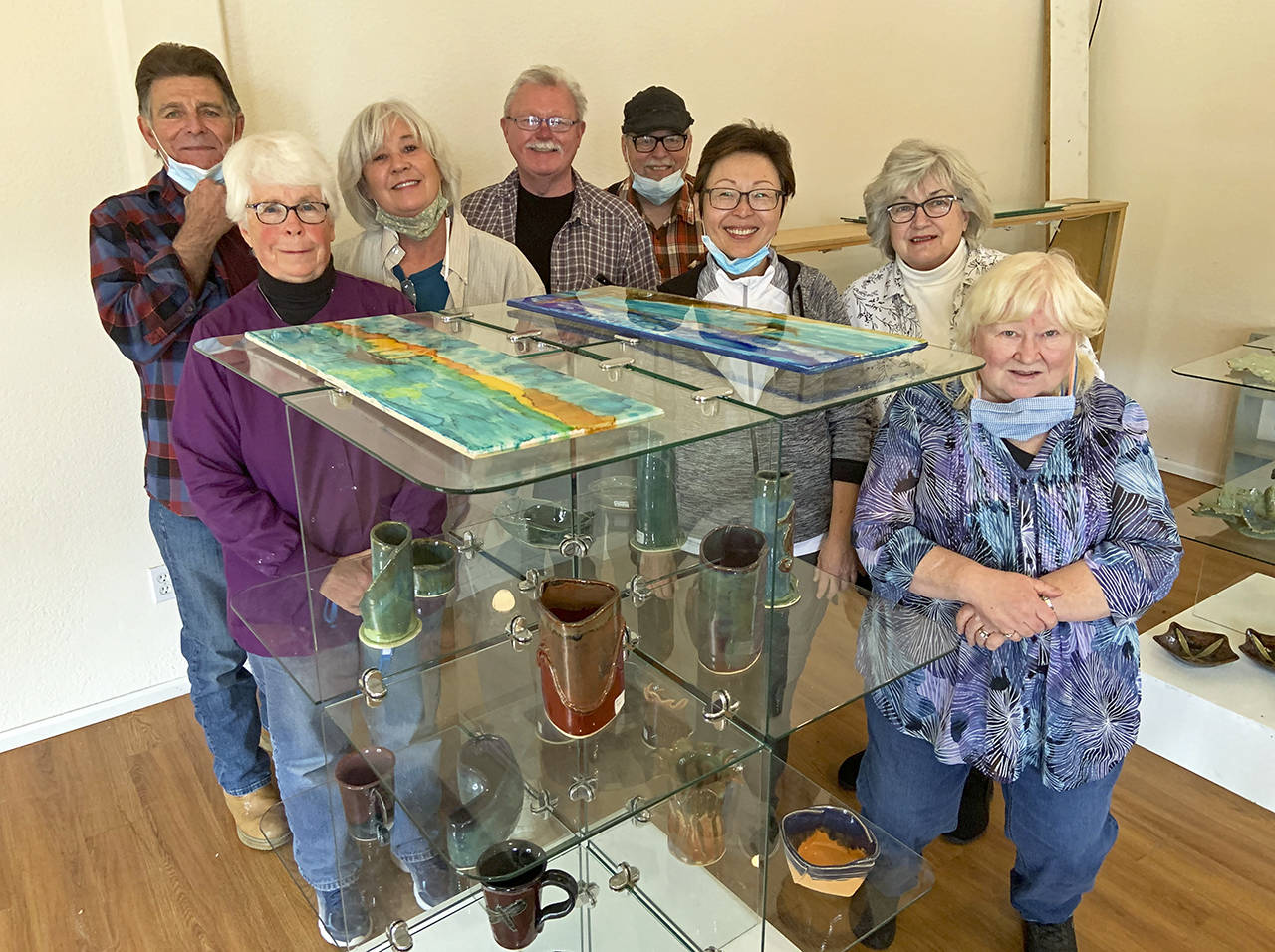 Ten local artisans have established the Grays Harbor Potters Guild at 2244 Simpson Ave. in Hoquiam. They plan to open their space next weekend for demonstrations and retail sales. Initial hours will be 10 a.m. to 3 p.m. every Friday through Sunday. Pictured, from left, are Gary Ganz, Lyn Nelson, Cindy Dana, Ken Slaughter, Richard Young, Evie Cheung, Melanie Knight and Pam Otteson. The two members not pictured are Sandy Early and Nancy Williams. Watch The Daily World next week for the full story.
Photo by Kat Bryant | The Daily World